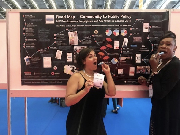 SWOP Behind Bars volunteers display the #SWPrEP poster, Road Map: Community to Public Policy at International AIDS Conference 2018 in Amsterdam.