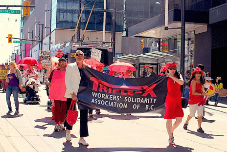 Our numbers grew as we headed down the street along Granville. Photo: Esther Shannon