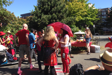 Red Umbrella marchers arrive to fresh-sliced watermelon and oranges. Photo: Kerry Porth