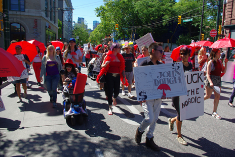 Heading down Hastings Street the crowd got a little more rowdy. Photo: Elaine Ayres